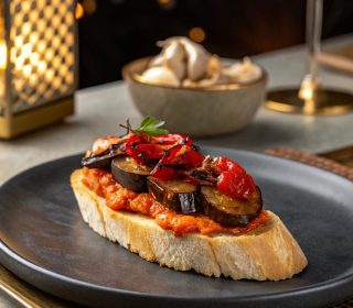 Roasted Eggplant, Red Pepper Hummus, Marinated Tomato, Roasted Garlic (V)